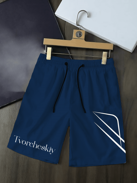 blue shorts for men from tvorcheskiy hanged over a table