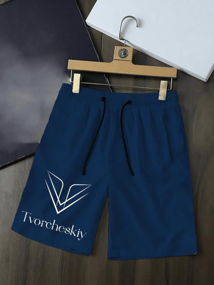 dark blue shorts for men from tvorcheskiy hanged over a table